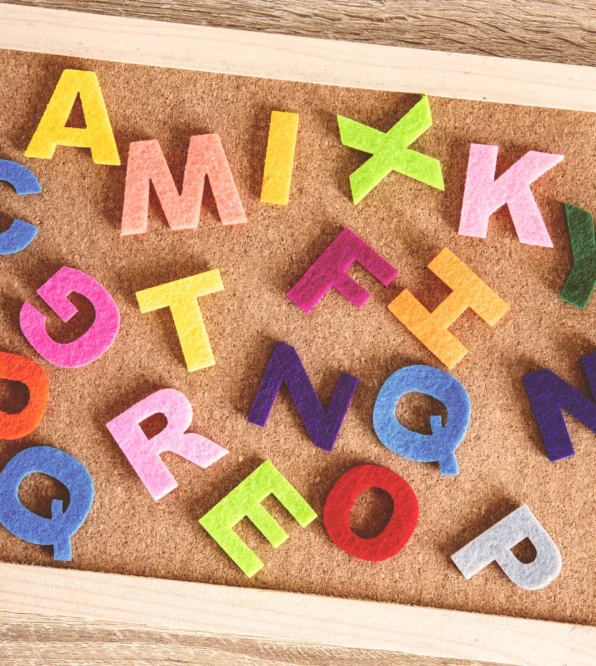 vecteezy_letters-on-cork-board_1223434